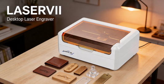 Glowforge alternative hero - a LASERVII M1s 24W enclosed desktop laser engraver on a warm workbench beside engraved leather, wood, acrylic and brass samples